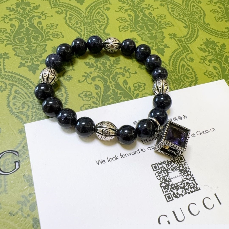 G*u*i bracelets